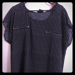 Woman’s shirt sleeve blouse